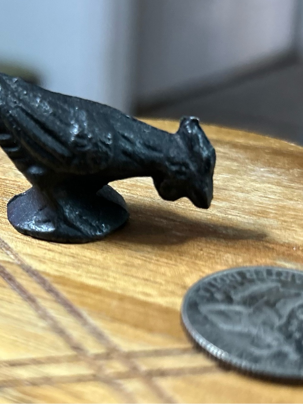 Cute little cast iron chicken trinket.